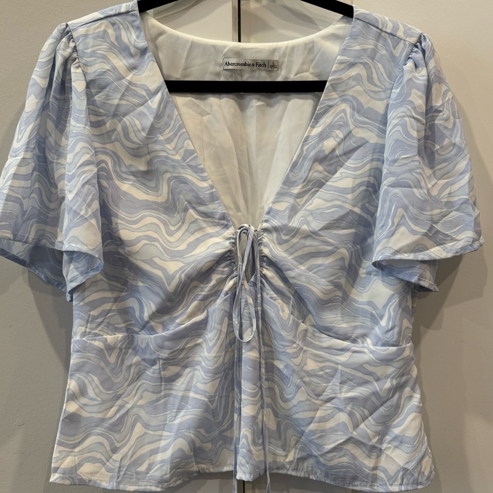 Abercrombie light blue shirt, size large, tie in the front